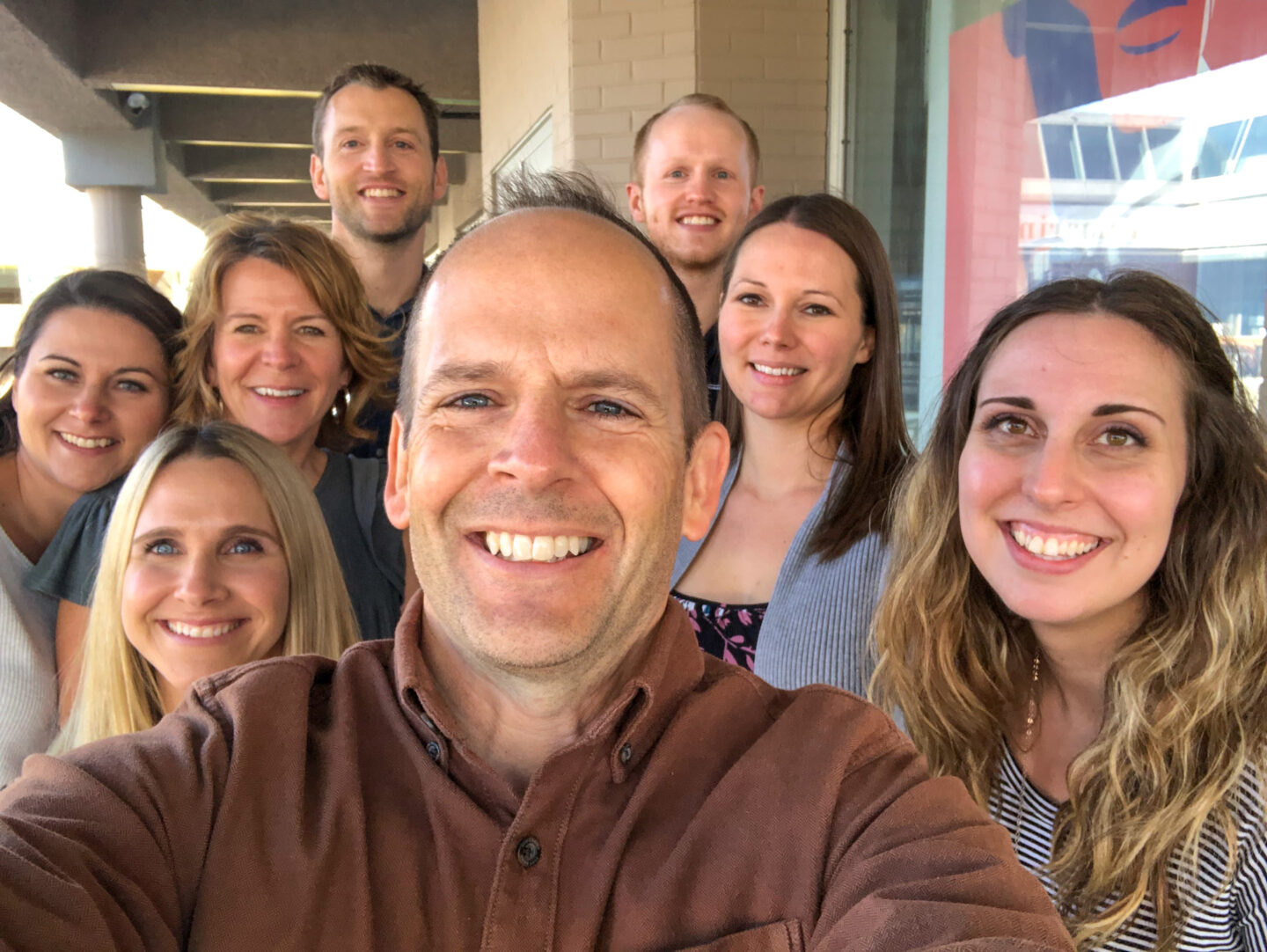 North 49 Physical Therapy team members smiling for a selfie photo.